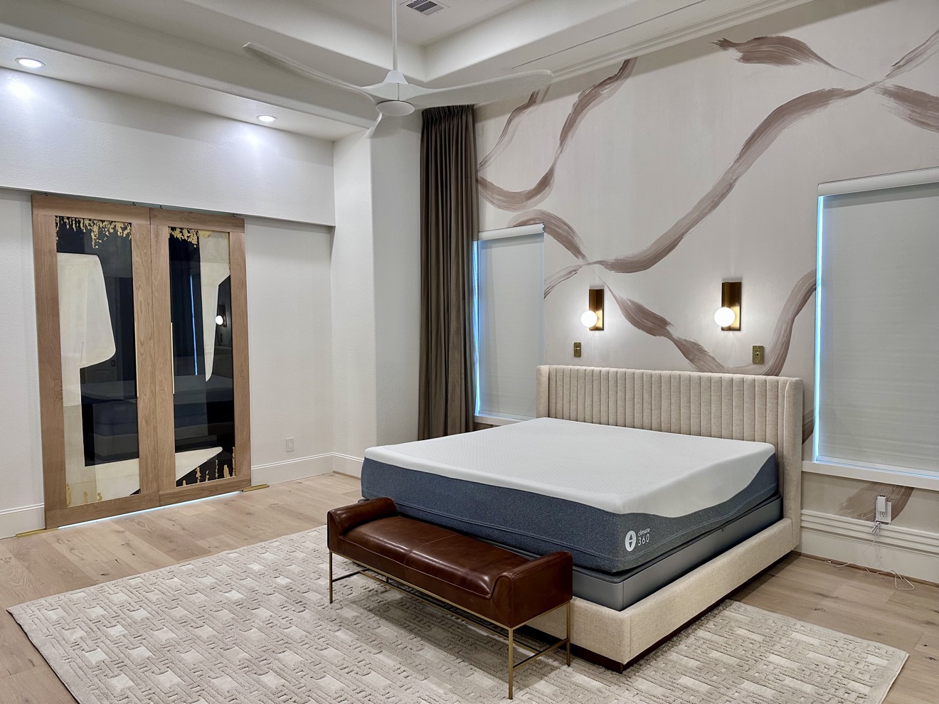 Abstract mural installed as a bedroom feature wall