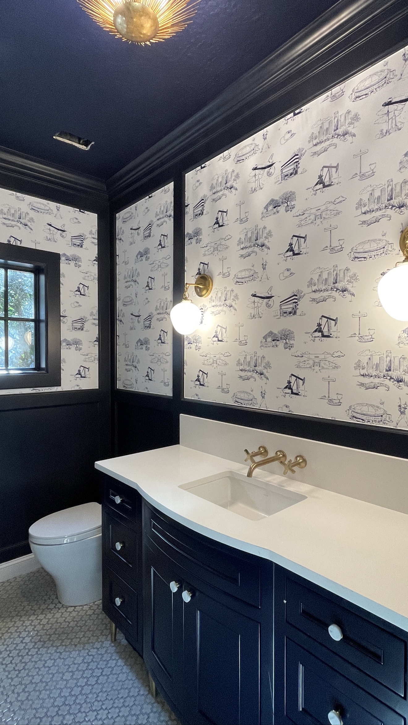Houston toile wallpaper installed in a powder room